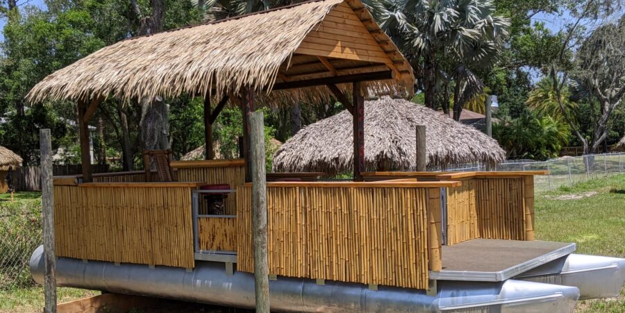 all bamboo faced tiki hut boat with A frame roof