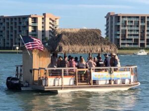 commercial rectangular tiki hut boat on water