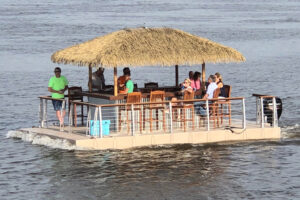 added synthetic thatch roof to boat