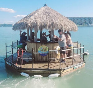 tiki boat octagon in water with bar